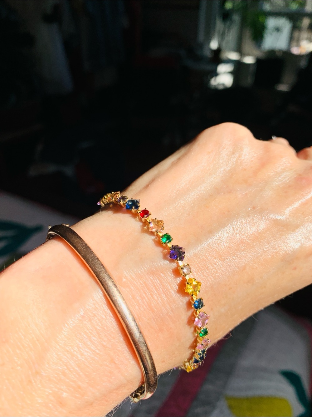 New Unworn multicoloured crystal bracelet, gold plate.